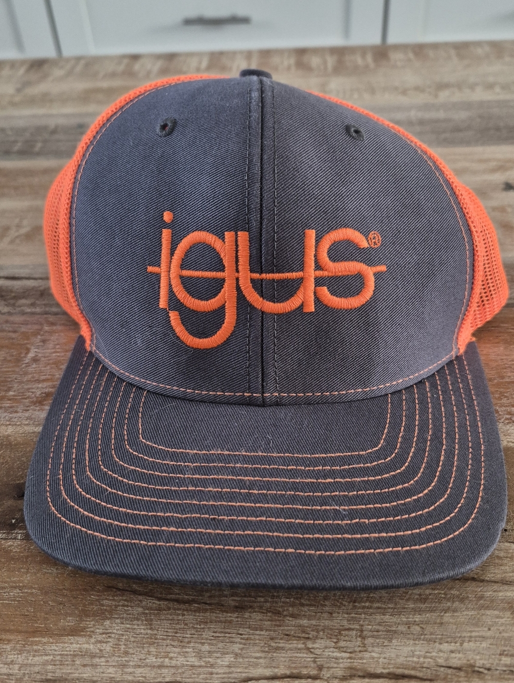 Richardson Style 112 igus Gray & Orange Mesh Logo Trucker Hat.